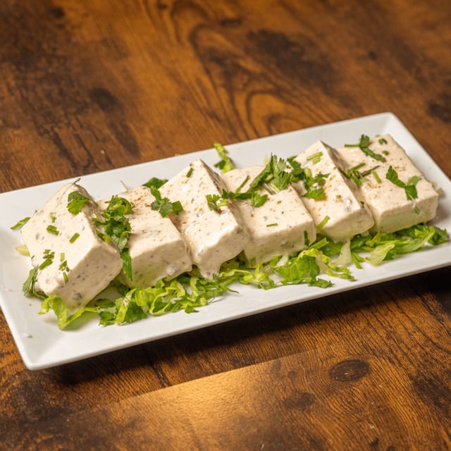 Malai Paneer Tikka Delight.